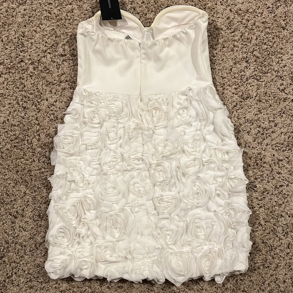 Fashion Nova size L white strapless dress with 3D flowers on bottom portion - Picture 3 of 3